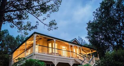 Polished wooden floor Queenslander with big mountain views and U-shaped deck