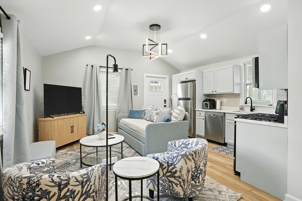 Smart TV, fireplace, books, offices