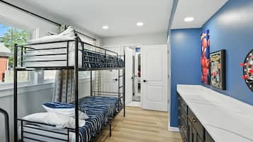 4 bedrooms, desk, iron/ironing board, travel crib