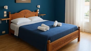 Tabla de planchar con plancha, wifi y ropa de cama