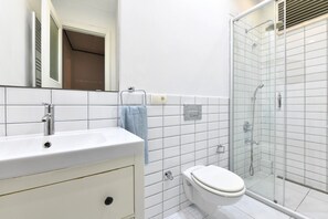 Hair dryer, towels, soap, toilet paper