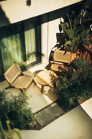 Deluxe kamer, uitzicht op tuin | Terras