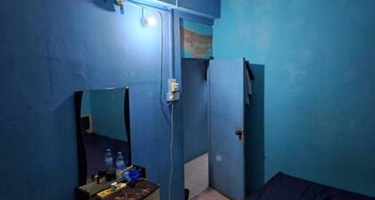 Charming large studio style room with attached bathroom in Malé with WiFi, AC