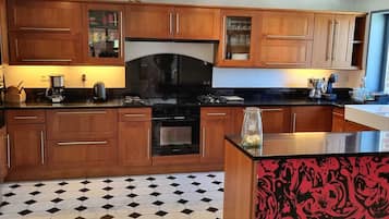 Fridge, microwave, dishwasher, coffee/tea maker