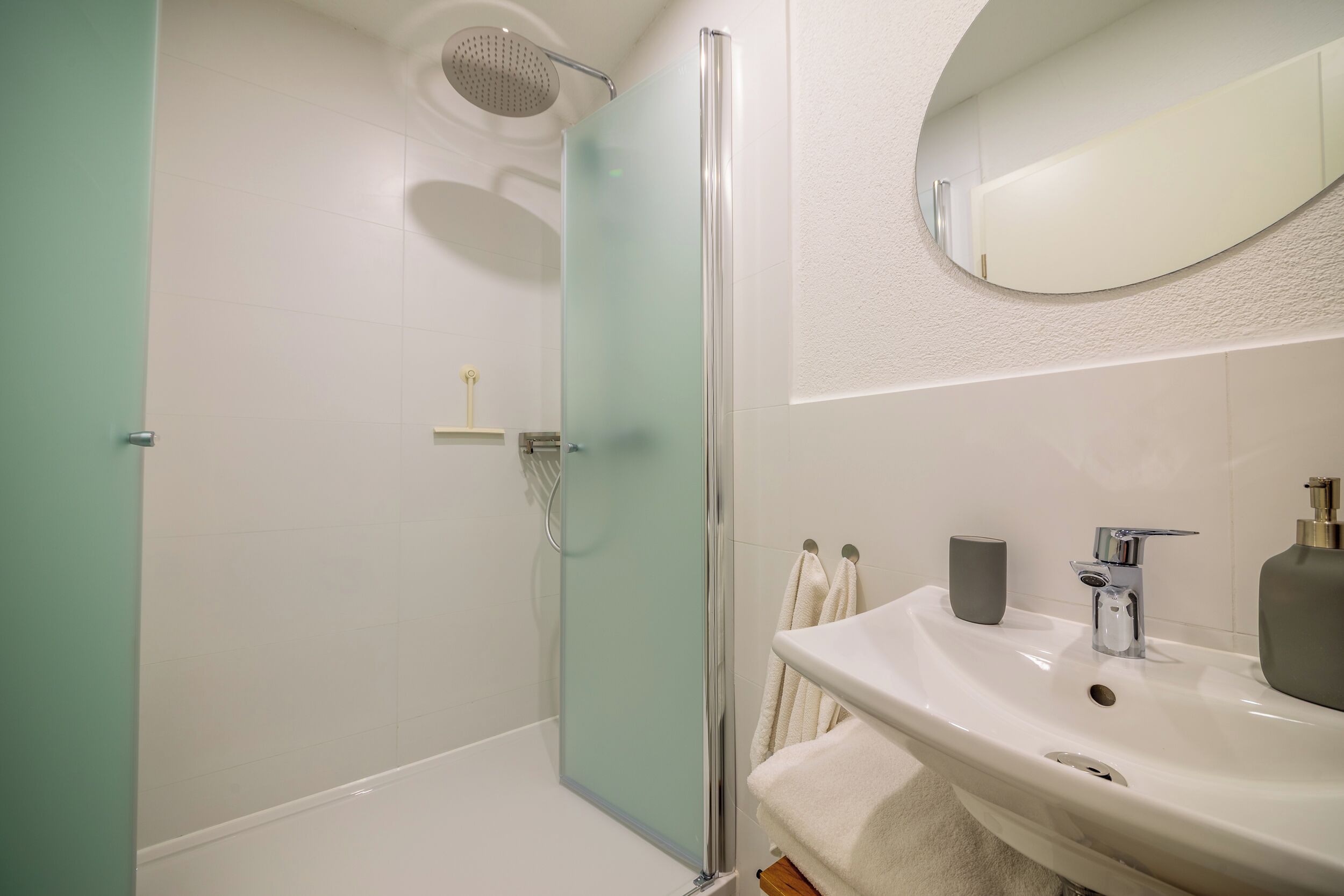 Shower, towels, soap, toilet paper