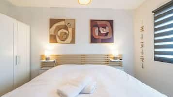 1 dormitorio, tabla de planchar con plancha, cuna de viaje y wifi