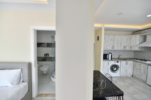 Family Condo, Balcony | Living area | TV - Lamira Pansion (Fethiye)