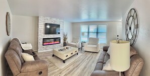 Smart TV, fireplace, books
