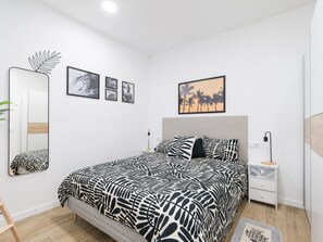 Casa | 2 habitaciones y tabla de planchar con plancha