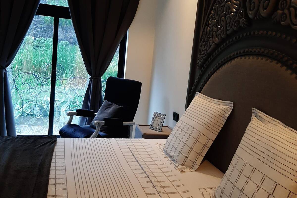 Suite, 1 King Bed, Mountain View | In-room safe, blackout drapes, free WiFi