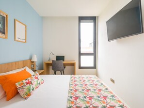 Apartamento | 2 dormitorios y tabla de planchar con plancha