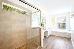 Shower, hair dryer, towels, shampoo