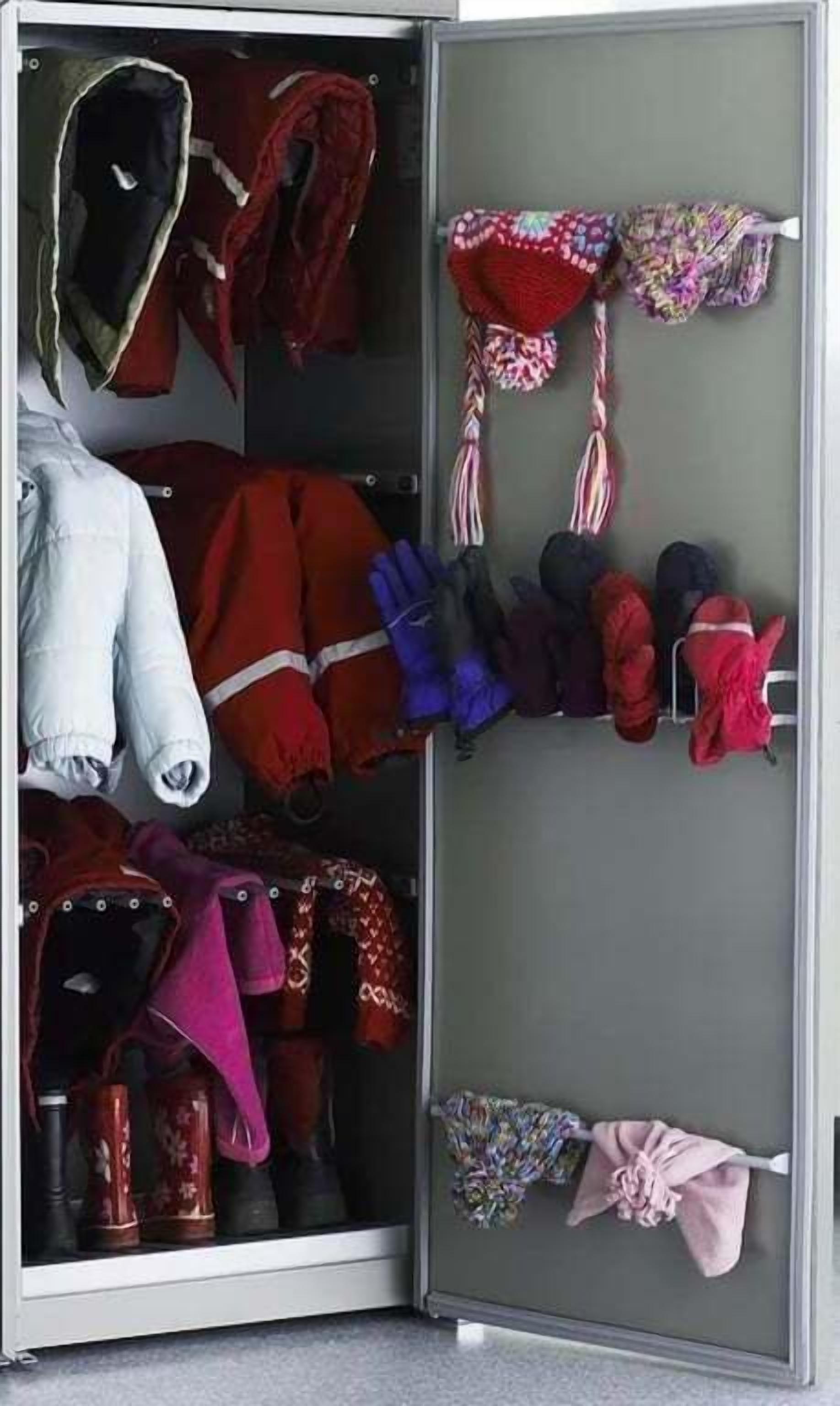 A closet with various garments and accessories, including hats, gloves, and shoes.