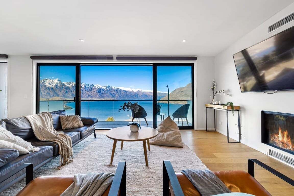 TV, fireplace, books