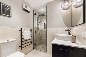 Hair dryer, towels, soap, shampoo