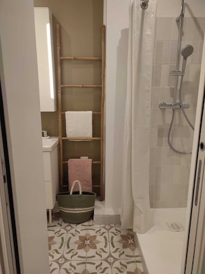Hair dryer, towels, soap, toilet paper