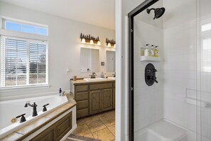 Shower, jetted tub, hair dryer, towels