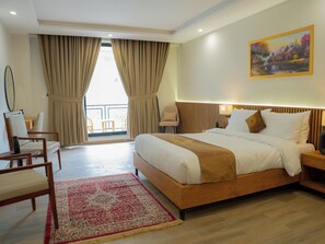 Deluxe Double Room, River View | Desk, laptop workspace, iron/ironing board, free WiFi
