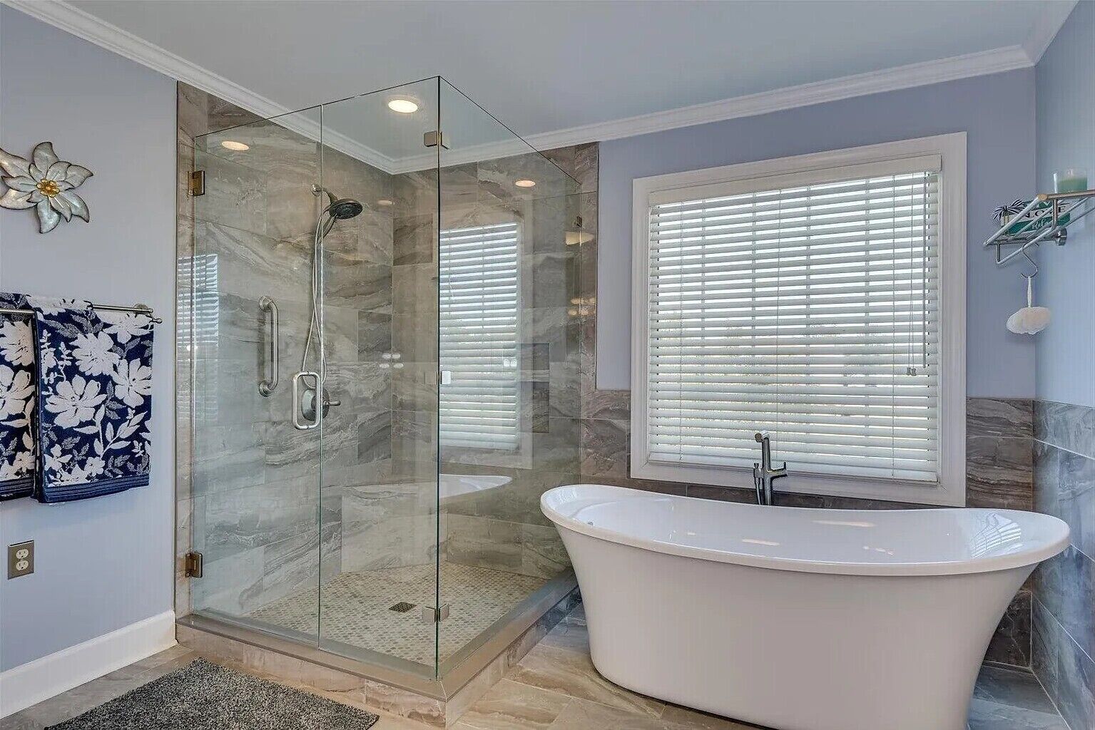 Shower, hair dryer, towels, toilet paper