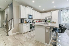 Microwave, dishwasher, coffee/tea maker, highchair