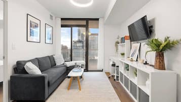 Apartamento, vistas a la ciudad | Zona de estar