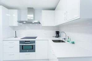 House | Private kitchen - Beachfront Apartment in Mogan With Ocean Views (Mogan)