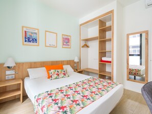Apartamento | 1 dormitorio y tabla de planchar con plancha