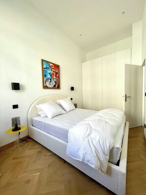 1 bedroom, laptop workspace, iron/ironing board, bed sheets