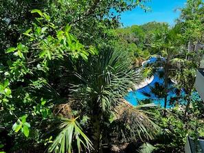 Resort view - Modern Condo Jungle Retreat (Puerto Aventuras)