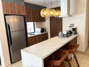 Luxury Apartment, Balcony, Golf View | Private kitchen - Modern Condo Jungle Retreat (Puerto Aventuras)