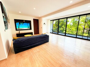 Deluxe Apartment | Living area | 60-inch LED TV with digital channels, Netflix, streaming services