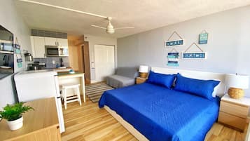 Tabla de planchar con plancha, wifi gratis, ropa de cama