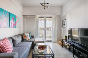 Apartment, 2 Bedrooms, Kitchen, City View | Living room | 53-inch Smart TV with digital channels, streaming services