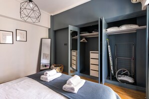 Apartment, 2 Bedrooms, Kitchen, City View | Desk, laptop workspace, blackout drapes, iron/ironing board