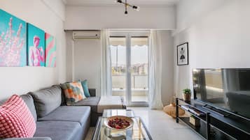 Apartment, 2 Bedrooms, Kitchen, City View | Living room | 53-inch Smart TV with digital channels, streaming services