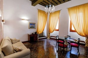 Suite, 2 Bedrooms, City View | Living area | TV