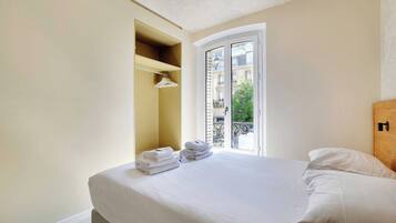 1 chambre, fer et planche Ă repasser, draps fournis