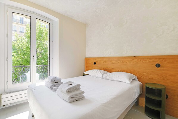 Apartemen | 1 kamar tidur, setrika/meja setrika, dan seprai linen