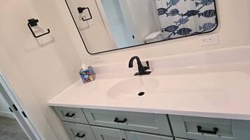 Hair dryer, towels, soap, toilet paper