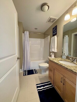Hair dryer, towels, soap, toilet paper