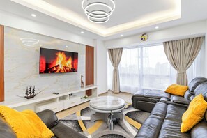 Living area - 2-bedroom apartment in charming Westlands, Nairobi, with WiFi, fitness room (Nairobi)