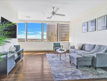 As you take a seat in the living room, the comfortable furniture and tasteful design make it easy to unwind.