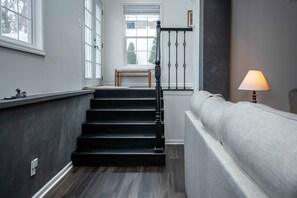 House, Multiple Beds, Patio, Garden View (The Greystone) | Living area | 42-inch flat-screen TV with digital channels, fireplace - The Greystone - Stay for 12! (Lake Geneva)
