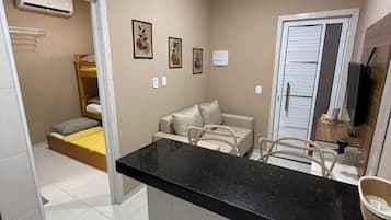 Comfort Apartment | Private kitchenette | Cleaning supplies, paper towels