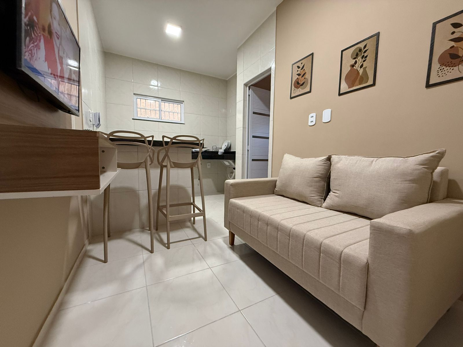 Comfort Apartment | Living area | 43-inch flat-screen TV with digital channels