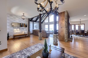 Älytelevisio, takka, pöytäjalkapallopöytä, kirjoja