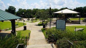 A park entrance with a sign, pathways, and a gazebo. - Charming historic home steps from downtown LaGrange (LaGrange)