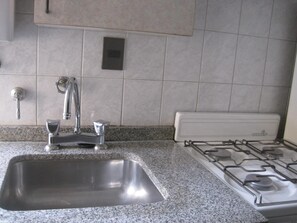 Private kitchen - Apart Hotel Magalí (Córdoba)