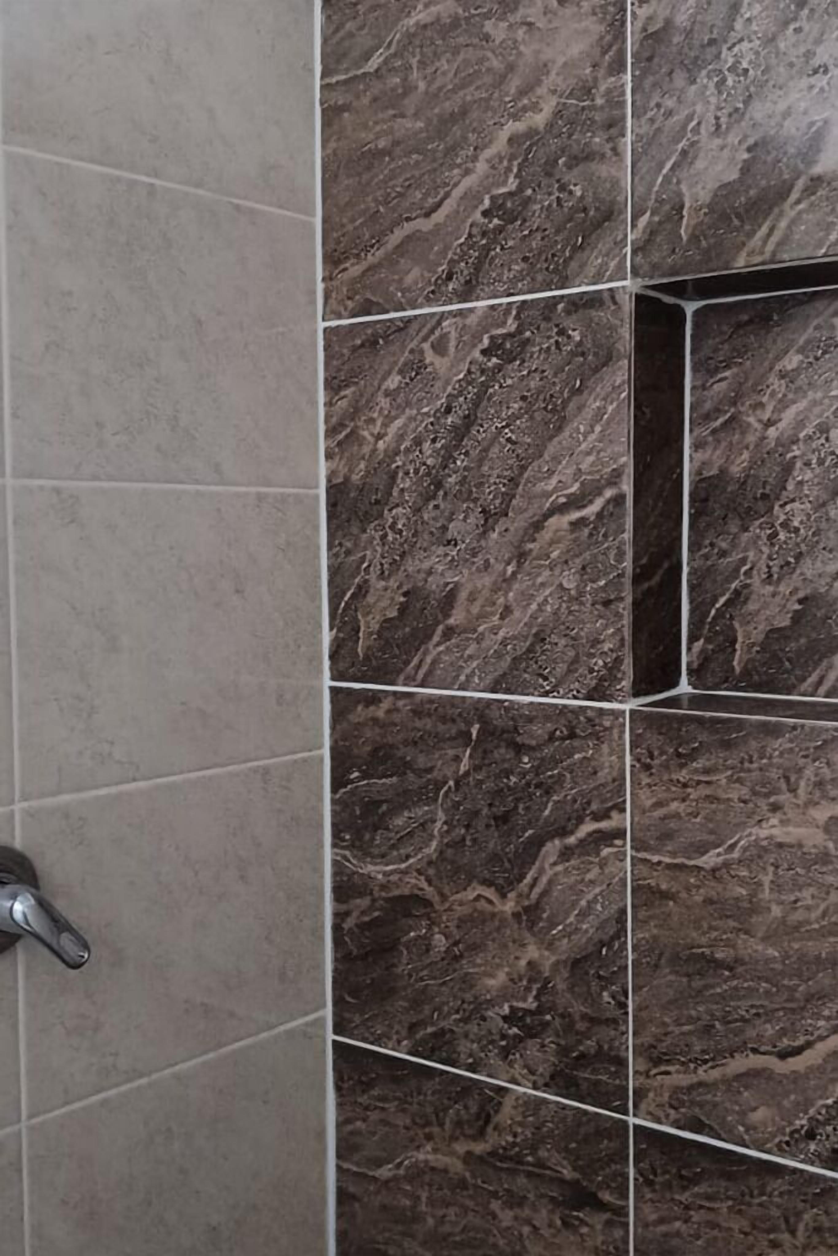 Shower, hair dryer, towels, toilet paper