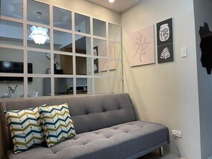 Basic Condo, Balcony, Pool View | Living area